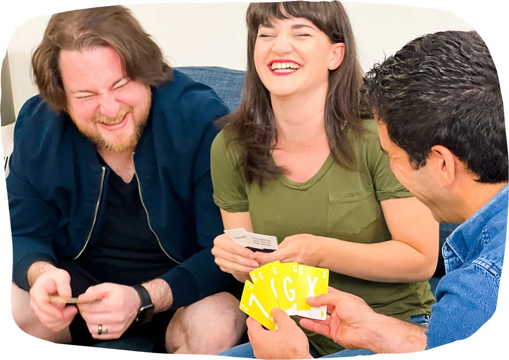 Friends laughing while playing Slingz